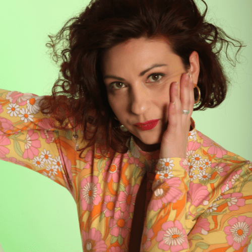 graphic with photo of wmnsWORK alumna, Njeri Gachuhi, owner of The Travelling Wakili based out of Kenya